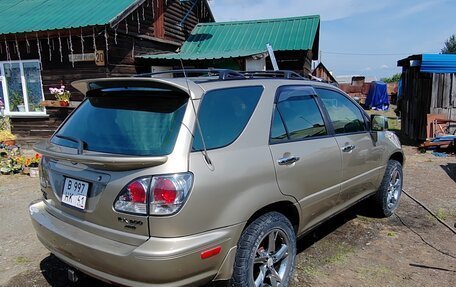 Lexus RX IV рестайлинг, 1999 год, 900 000 рублей, 3 фотография