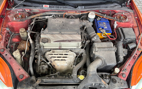 Mitsubishi Eclipse IV рестайлинг, 2006 год, 1 500 000 рублей, 17 фотография