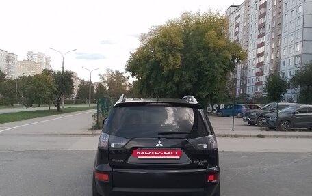 Mitsubishi Outlander III рестайлинг 3, 2010 год, 990 000 рублей, 4 фотография