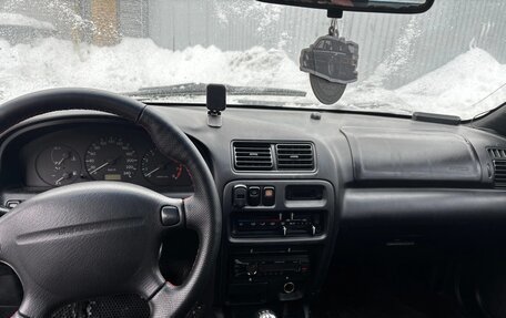 Mazda 323, 1997 год, 150 000 рублей, 9 фотография