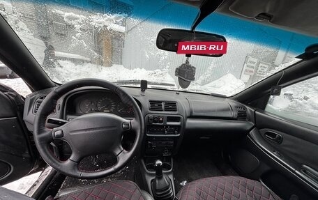 Mazda 323, 1997 год, 150 000 рублей, 8 фотография