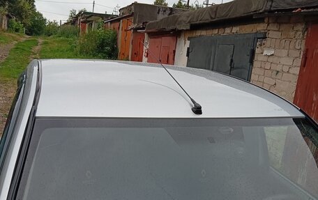 Renault Logan I, 2012 год, 450 000 рублей, 4 фотография