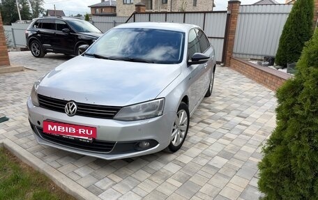 Volkswagen Jetta VI, 2013 год, 750 000 рублей, 3 фотография