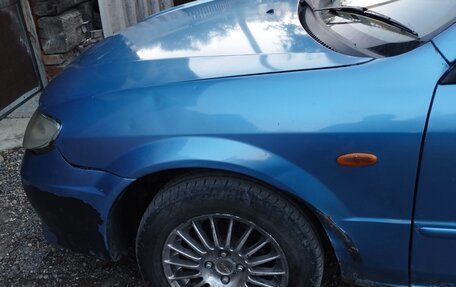 Mazda Familia, 2000 год, 300 000 рублей, 3 фотография