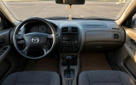 Mazda 323, 1999 год, 299 000 рублей, 6 фотография