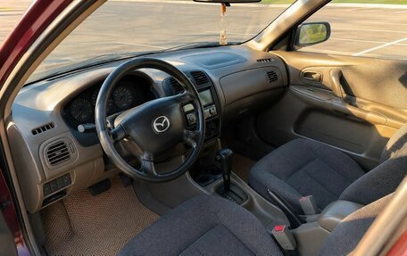 Mazda 323, 1999 год, 299 000 рублей, 5 фотография