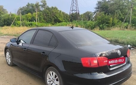 Volkswagen Jetta VI, 2013 год, 950 000 рублей, 3 фотография