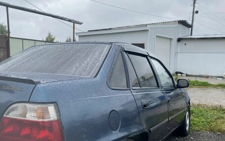 Daewoo Nexia I рестайлинг, 2004 год, 100 000 рублей, 2 фотография
