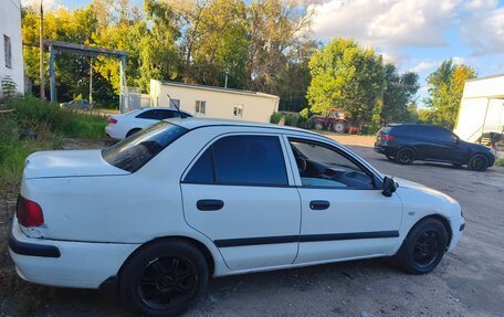 Mitsubishi Carisma I, 2003 год, 95 000 рублей, 3 фотография