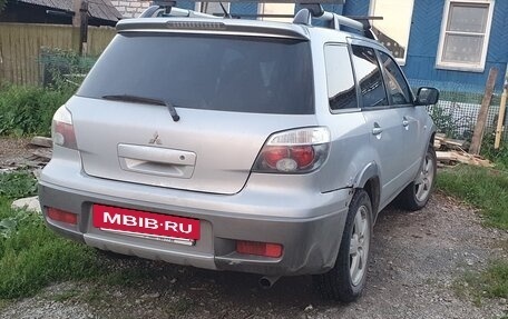 Mitsubishi Outlander III рестайлинг 3, 2004 год, 630 000 рублей, 4 фотография