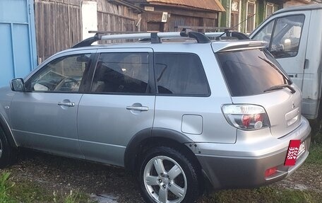 Mitsubishi Outlander III рестайлинг 3, 2004 год, 630 000 рублей, 11 фотография