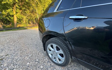 Cadillac SRX II рестайлинг, 2010 год, 985 000 рублей, 4 фотография