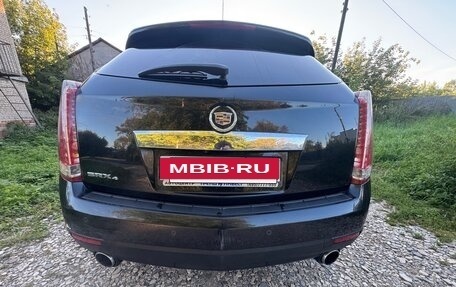 Cadillac SRX II рестайлинг, 2010 год, 985 000 рублей, 3 фотография