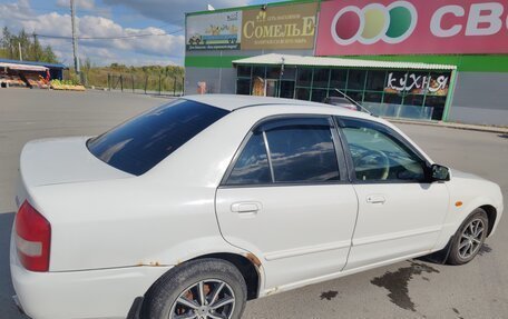 Mazda Familia, 2001 год, 250 000 рублей, 9 фотография
