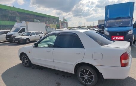 Mazda Familia, 2001 год, 250 000 рублей, 3 фотография