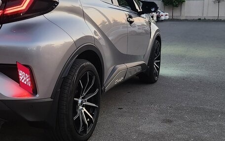 Toyota C-HR I рестайлинг, 2018 год, 2 374 000 рублей, 24 фотография