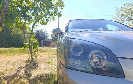 KIA Magentis II рестайлинг, 2007 год, 670 000 рублей, 25 фотография