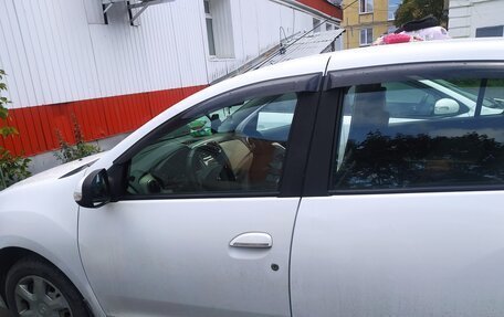 Renault Logan II, 2015 год, 820 000 рублей, 10 фотография
