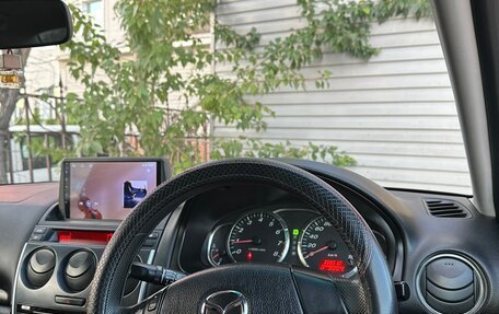 Mazda Axela, 2005 год, 595 000 рублей, 27 фотография