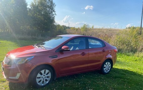 KIA Rio III рестайлинг, 2012 год, 750 000 рублей, 3 фотография