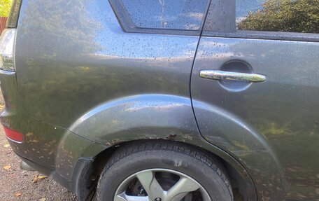 Mitsubishi Outlander III рестайлинг 3, 2011 год, 800 000 рублей, 7 фотография