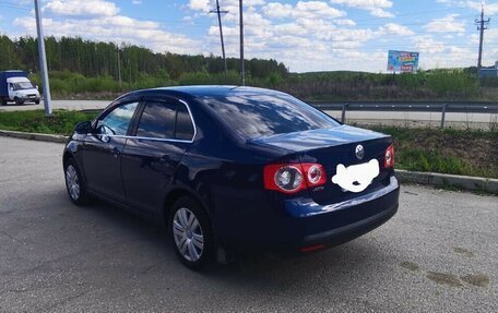 Volkswagen Jetta VI, 2010 год, 619 000 рублей, 3 фотография