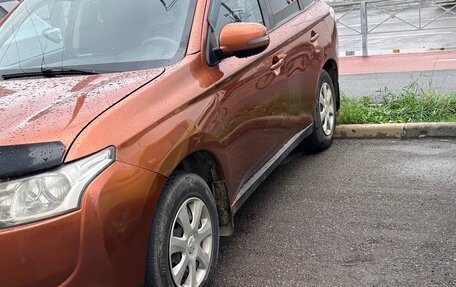 Mitsubishi Outlander III рестайлинг 3, 2012 год, 999 999 рублей, 2 фотография