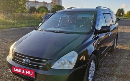 KIA Carnival III, 2009 год, 830 000 рублей, 1 фотография