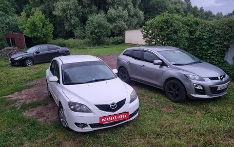 Mazda CX-7 I рестайлинг, 2011 год, 990 000 рублей, 2 фотография