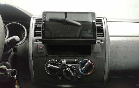 Nissan Tiida, 2010 год, 790 000 рублей, 12 фотография