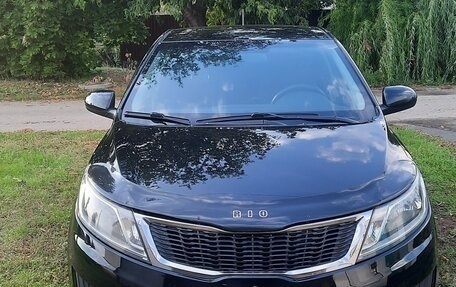 KIA Rio III рестайлинг, 2013 год, 970 000 рублей, 2 фотография