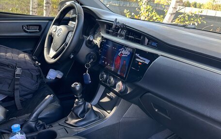 Toyota Corolla, 2013 год, 1 150 000 рублей, 14 фотография