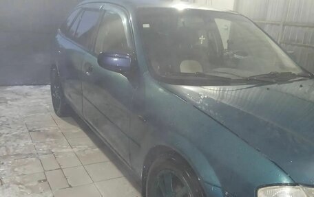 Mazda 323, 1999 год, 155 000 рублей, 11 фотография