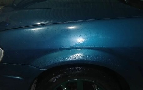 Mazda 323, 1999 год, 155 000 рублей, 17 фотография