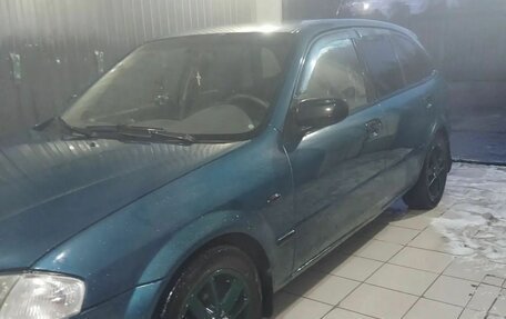 Mazda 323, 1999 год, 155 000 рублей, 13 фотография