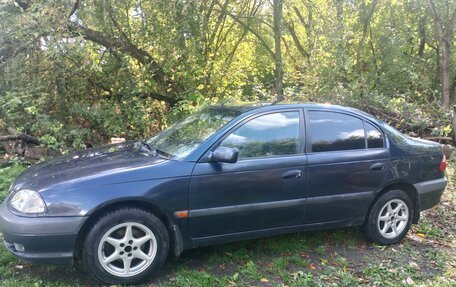 Toyota Avensis III рестайлинг, 2001 год, 350 000 рублей, 23 фотография