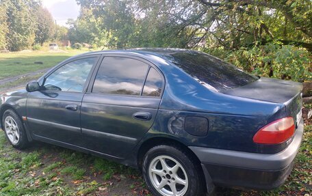 Toyota Avensis III рестайлинг, 2001 год, 350 000 рублей, 26 фотография