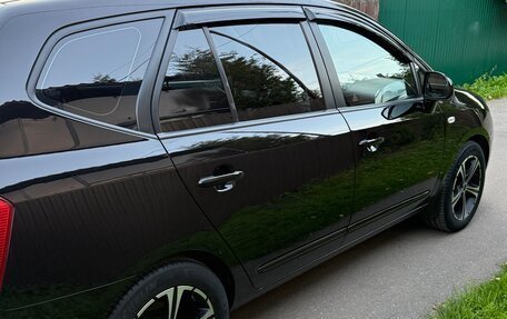KIA Carens III (RP), 2011 год, 1 035 000 рублей, 4 фотография