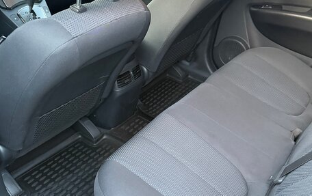 KIA Carens III (RP), 2011 год, 1 035 000 рублей, 8 фотография