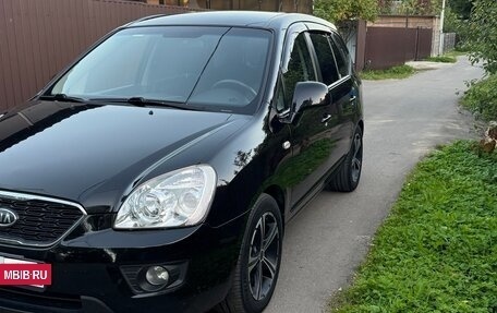 KIA Carens III (RP), 2011 год, 1 035 000 рублей, 2 фотография
