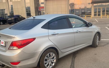 Hyundai Solaris II рестайлинг, 2011 год, 700 000 рублей, 12 фотография
