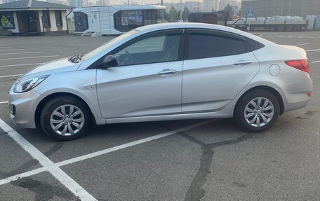 Hyundai Solaris II рестайлинг, 2011 год, 700 000 рублей, 14 фотография