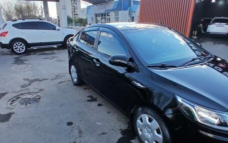 KIA Rio III рестайлинг, 2012 год, 700 000 рублей, 13 фотография