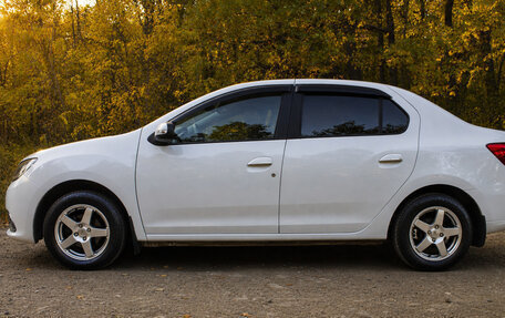 Renault Logan II, 2014 год, 700 000 рублей, 4 фотография