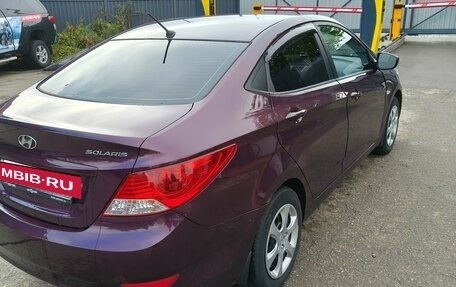 Hyundai Solaris II рестайлинг, 2011 год, 650 000 рублей, 14 фотография