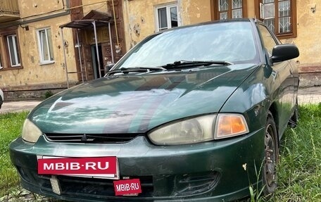 Mitsubishi Mirage VI рестайлинг, 1999 год, 100 000 рублей, 2 фотография