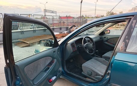 Toyota Avensis III рестайлинг, 1999 год, 220 000 рублей, 16 фотография