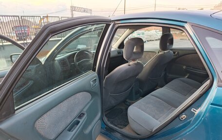Toyota Avensis III рестайлинг, 1999 год, 220 000 рублей, 17 фотография
