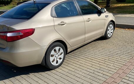 KIA Rio III рестайлинг, 2013 год, 750 000 рублей, 21 фотография
