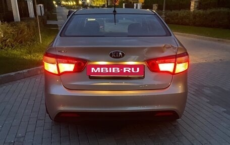 KIA Rio III рестайлинг, 2013 год, 750 000 рублей, 23 фотография
